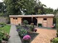 Dubbele tuinschuur met overkapping